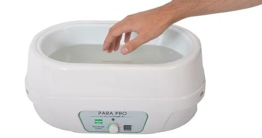 Parafino vonelė + 6 vnt. arbatmedžio parafino pakuotės (2,72kg) Parafino vonelė + 6 vnt. arbatmedžio parafino pakuotės (2,72kg)